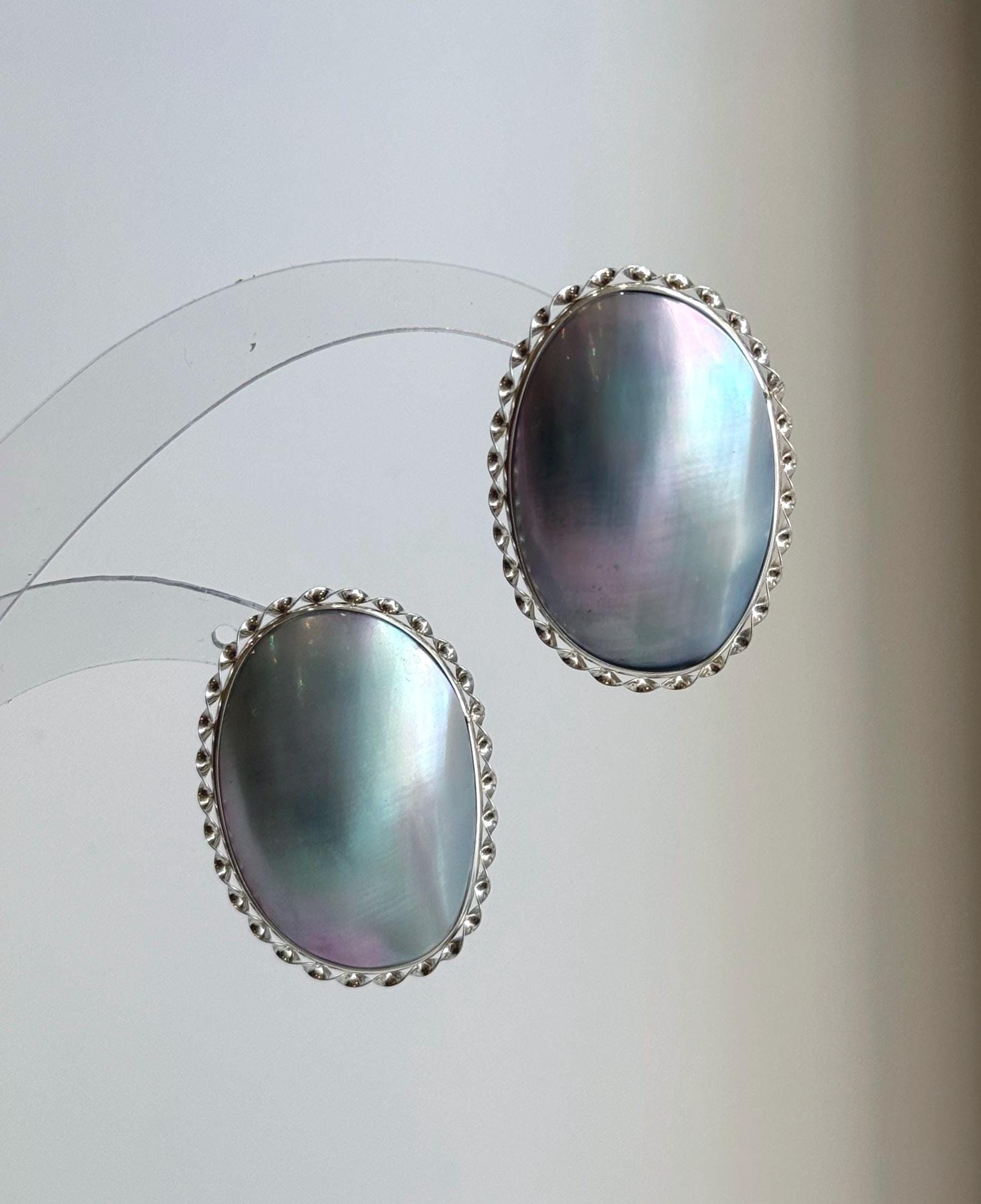 Large luminous ocean pearl earrings with mirrored blue luster