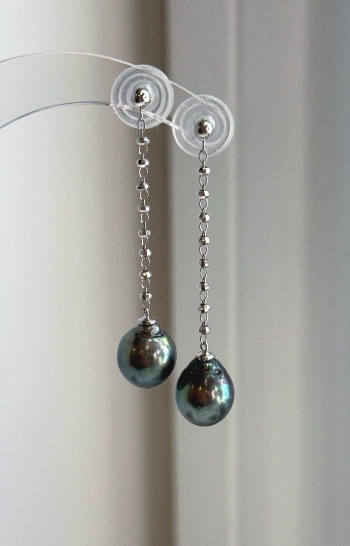 Tahitian peacock green ocean pearl chandelier earrings with extreme mirror luster and sterling silver design