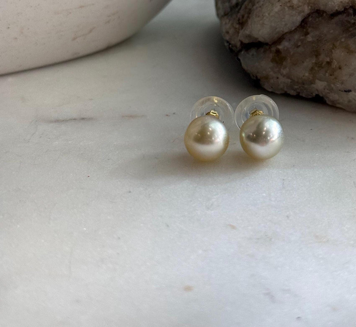 Champagne gold South Sea pearl stud earrings with elegant minimalist design