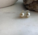 Champagne gold South Sea pearl stud earrings with elegant minimalist design