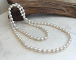 Elly’s 33.2” White Iridescent Drop Pearl Necklace | 7.5–8mm Genuine Pearls | Mirror Luster | Knotted | S925 Sterling Silver