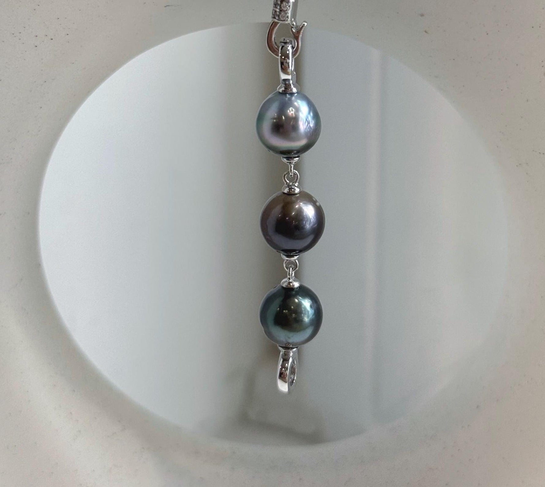 Tahitian peacock chocolate and hunter green pearl extender in S925 sterling silver.