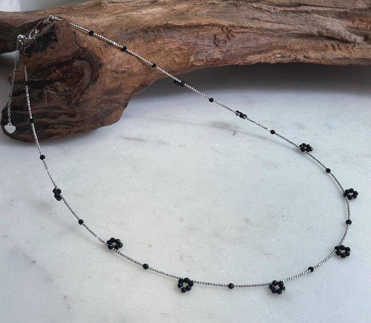 Dainty black spinel necklace with small sparkling faceted beads