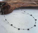 Dainty black spinel necklace with small sparkling faceted beads