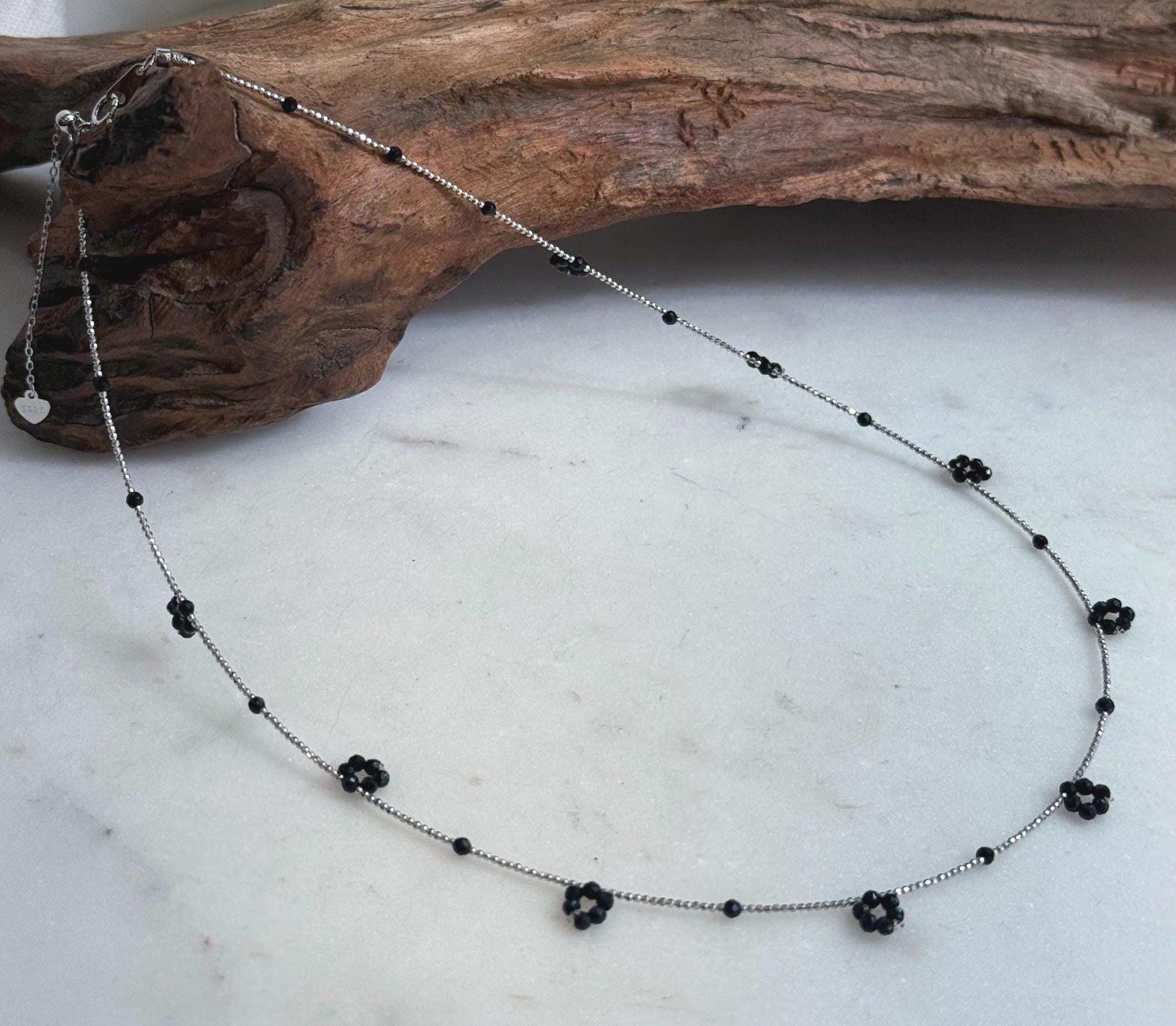 Dainty black spinel necklace with small sparkling faceted beads