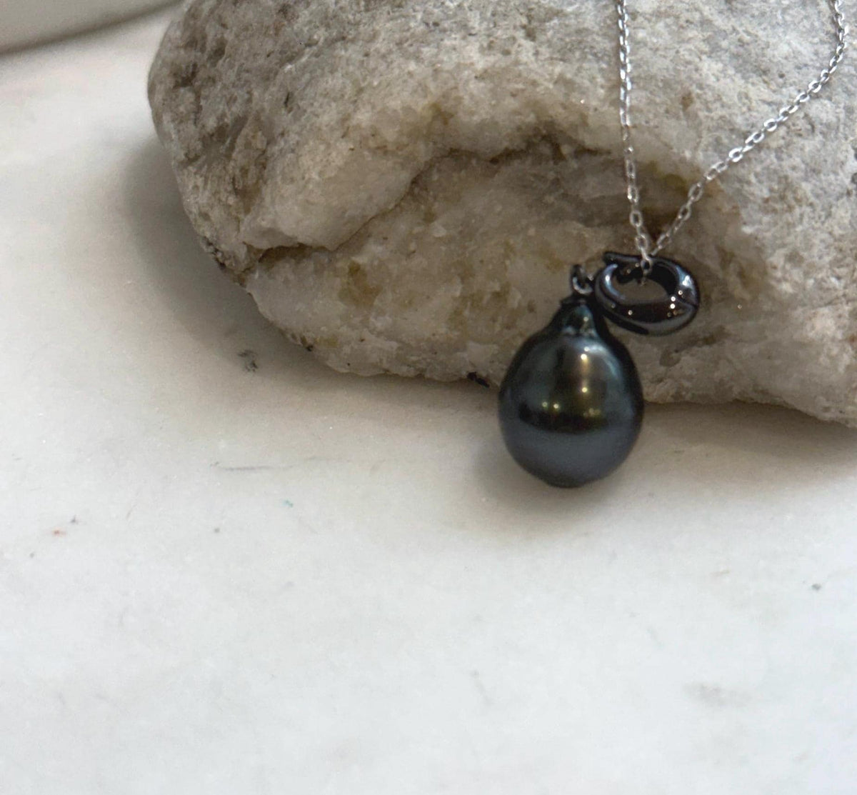 Tahitian black pearl pendant with deep hunter green iridescence