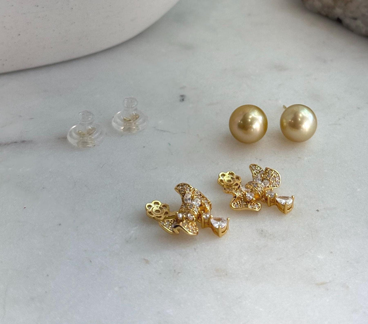 Genuine South Sea golden pearl earrings with rich deep tea gold color and sterling silver jackets.