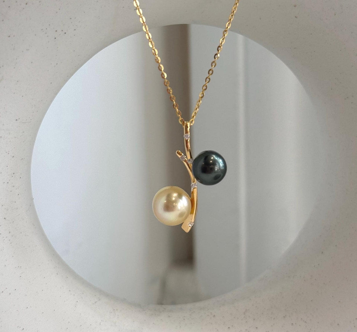 8.1–9.3mm Tahitian and South Sea golden pearl double pendant with mirror luster