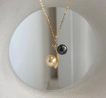 8.1–9.3mm Tahitian and South Sea golden pearl double pendant with mirror luster