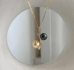 Two color saltwater pearl pendant featuring Tahitian and golden South Sea pearls
