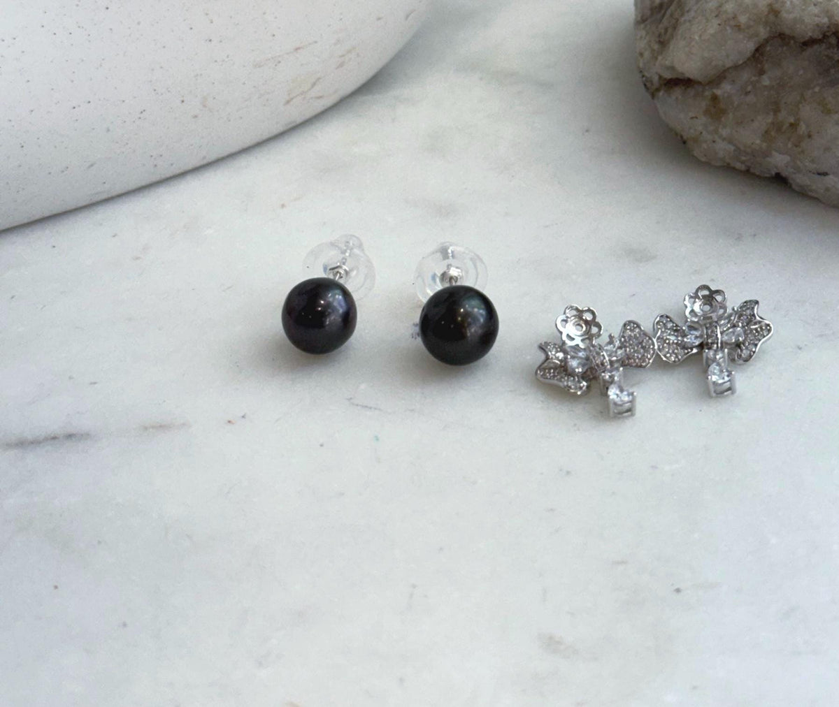 Tahitian black ocean pearl stud earrings with removable silver jackets