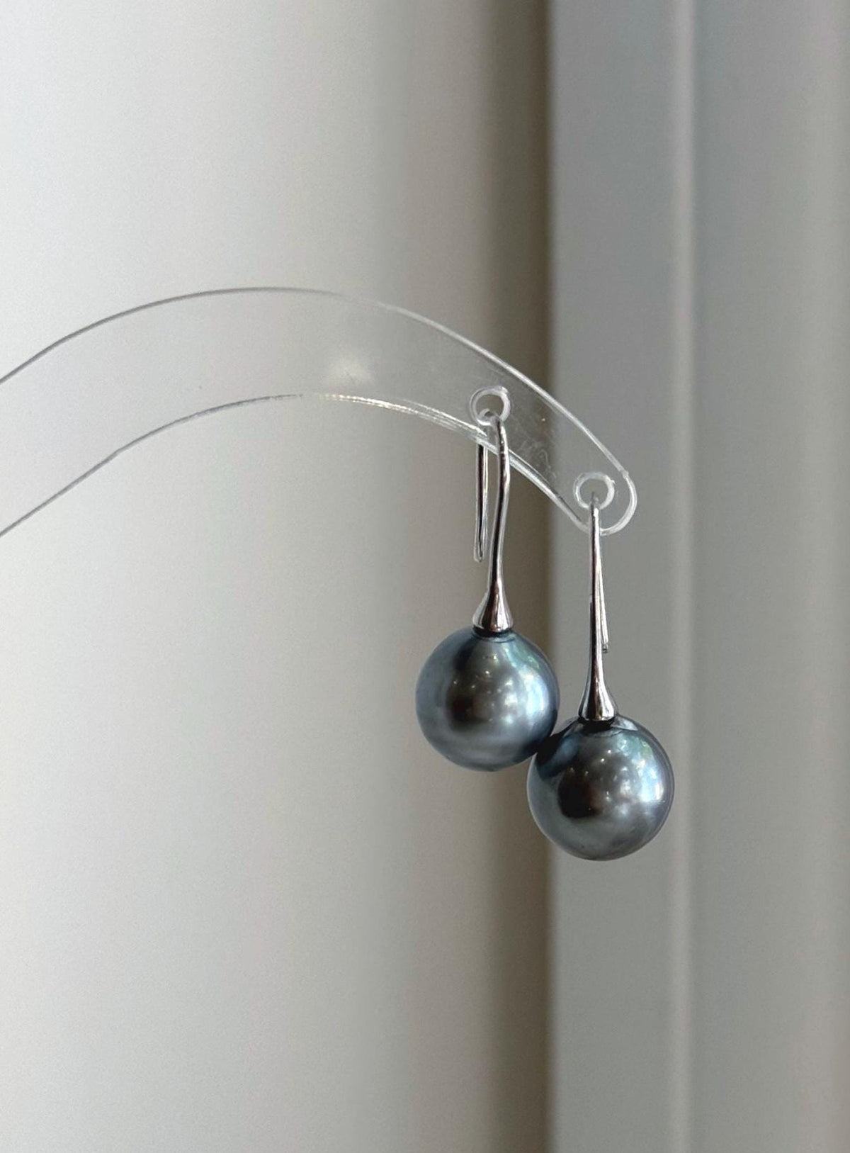 Natural Tahitian pearl earrings showing beautiful metallic reflections