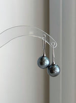 Natural Tahitian pearl earrings showing beautiful metallic reflections