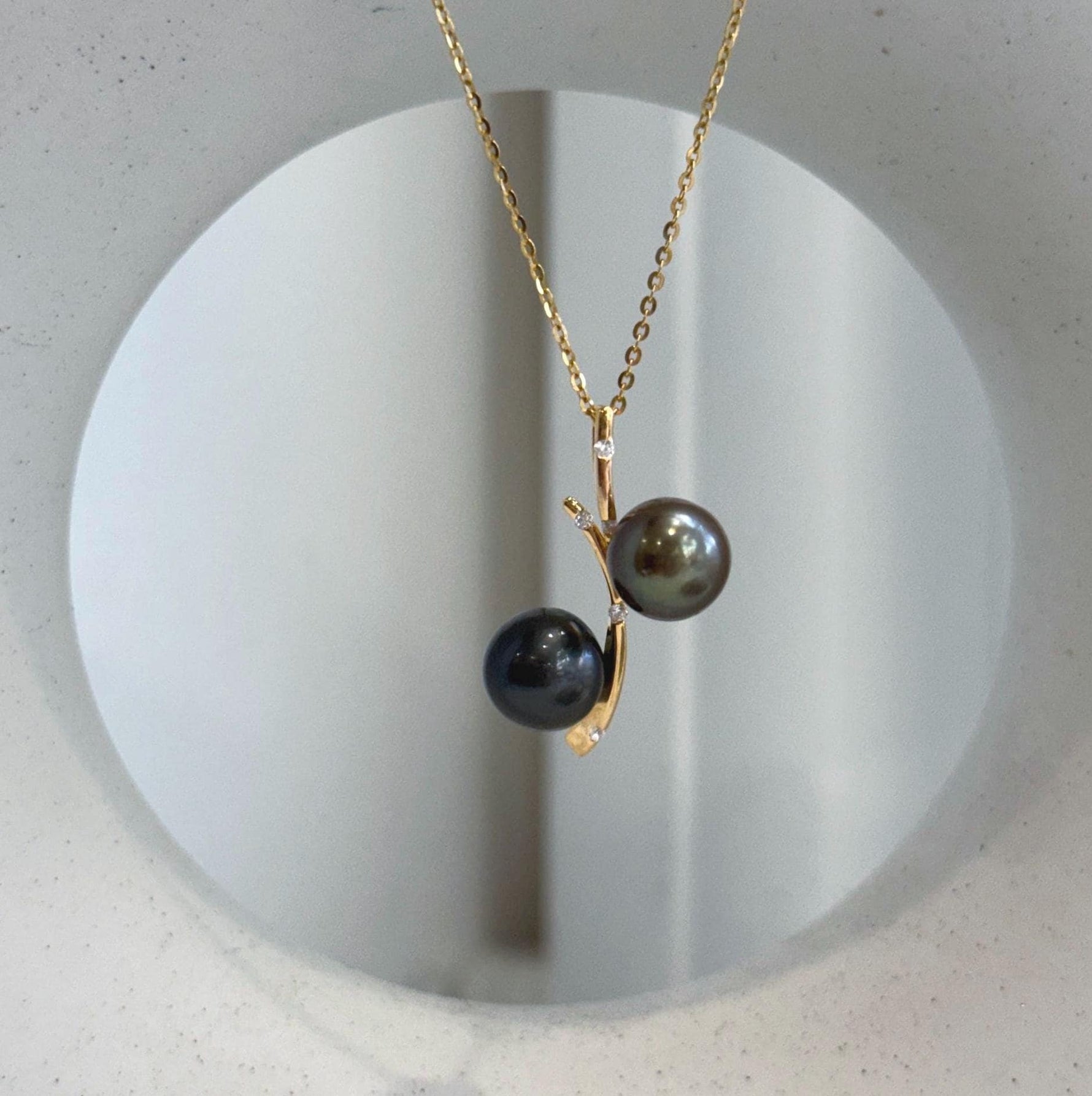 Double Tahitian ocean pearl pendant with beautiful mirror luster and sterling silver setting
