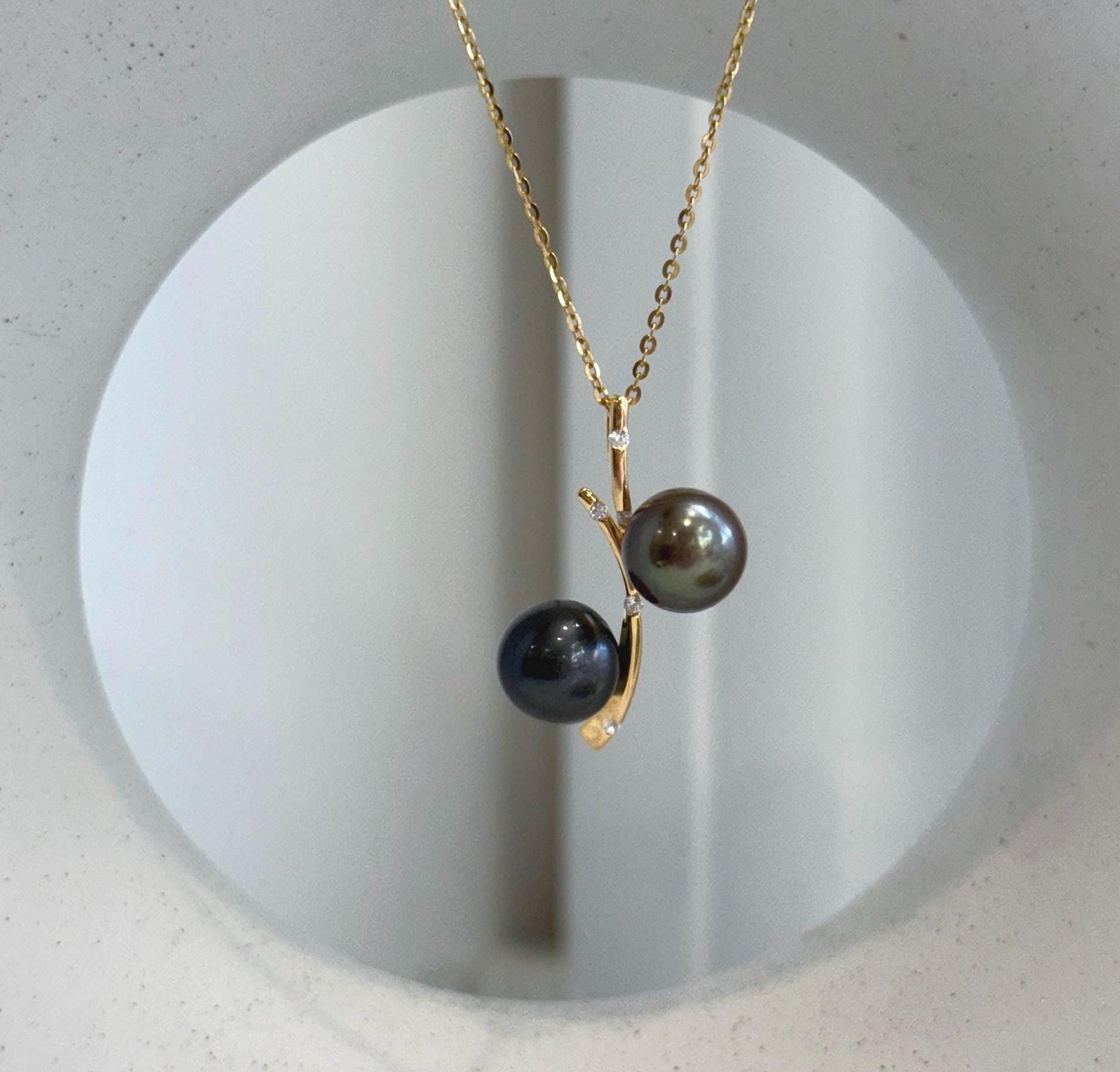 Elegant double Tahitian pearl pendant with rich natural ocean pearl colors