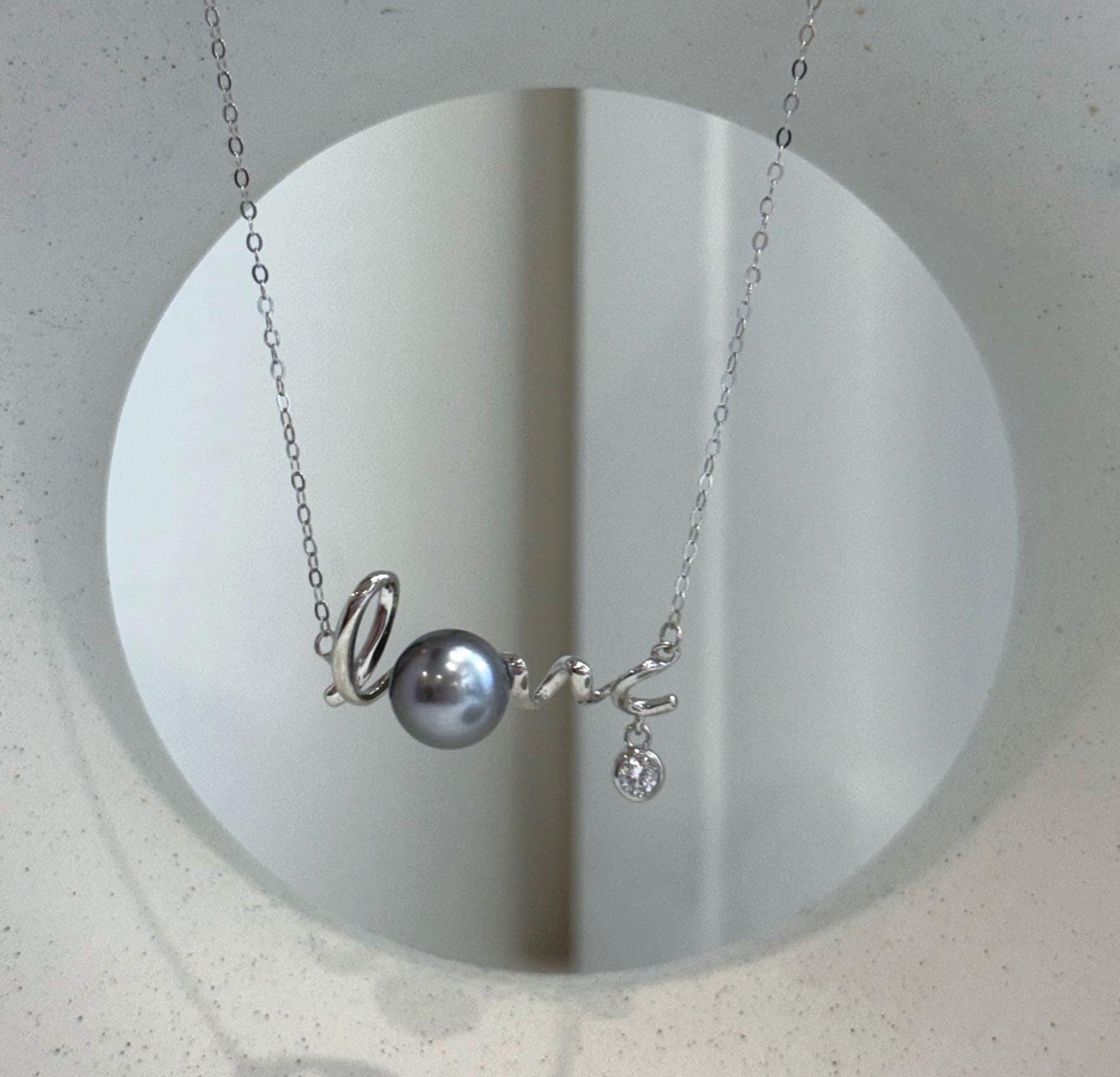 Tahitian ocean pearl love pendant chain set with mirror luster and sterling silver