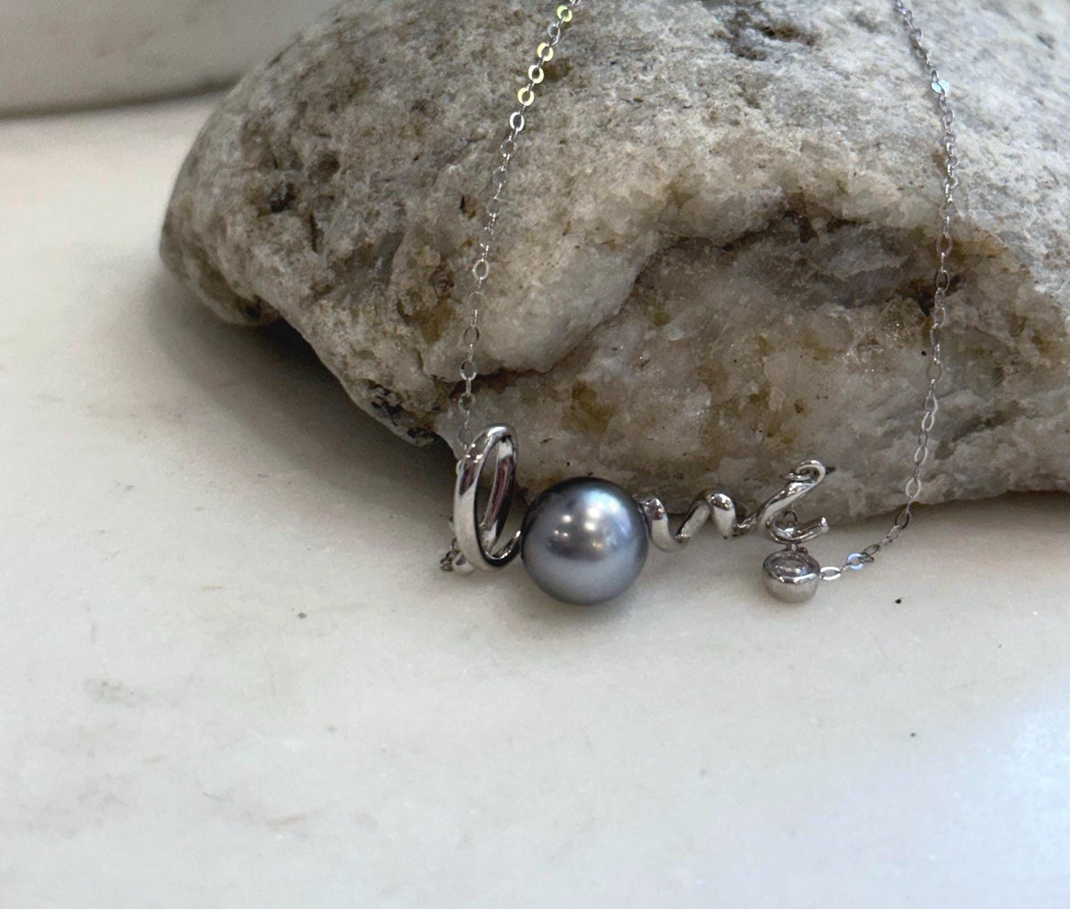 Genuine saltwater Tahitian pearl chain set with modern love pendant design