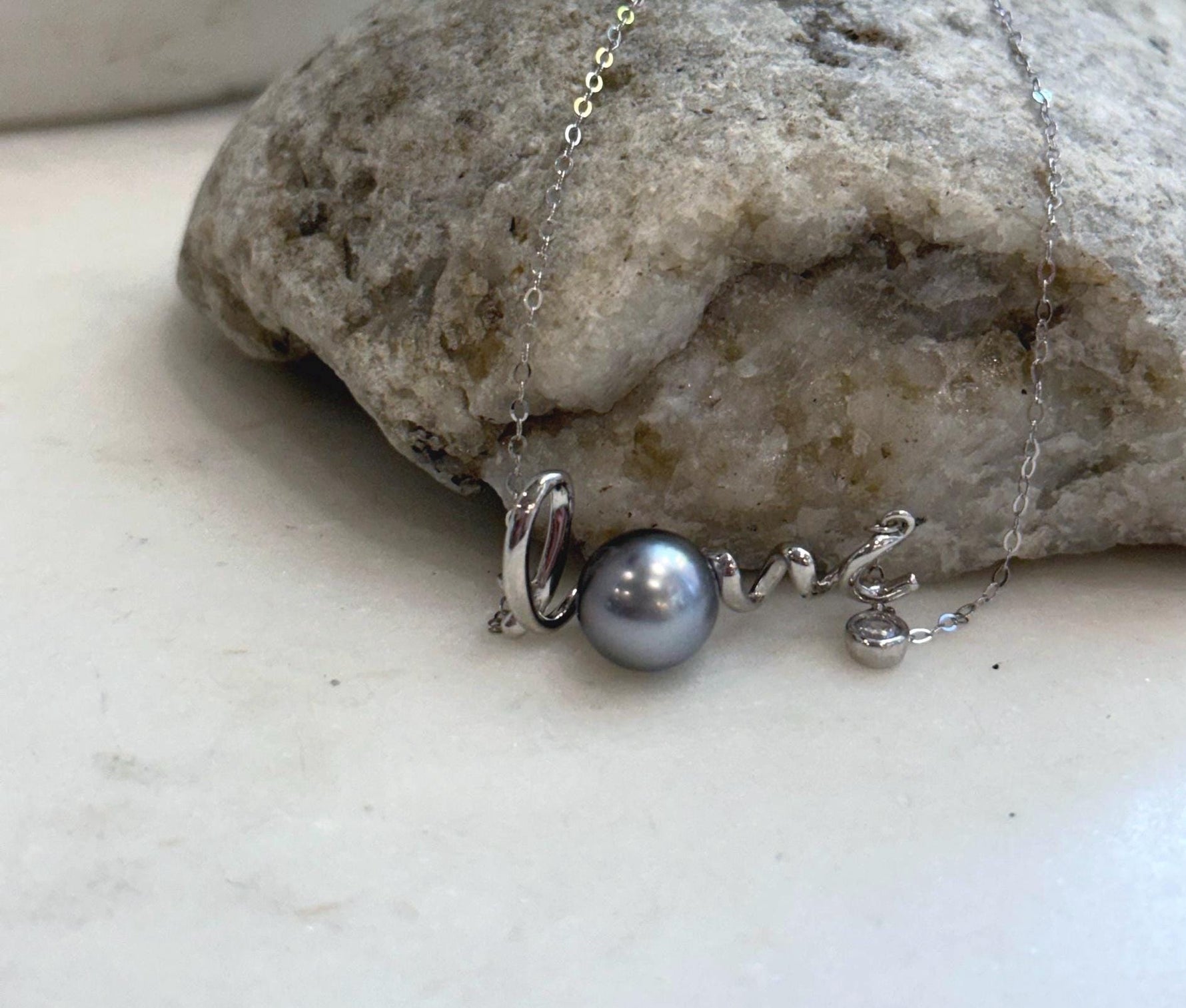 Genuine saltwater Tahitian pearl chain set with modern love pendant design