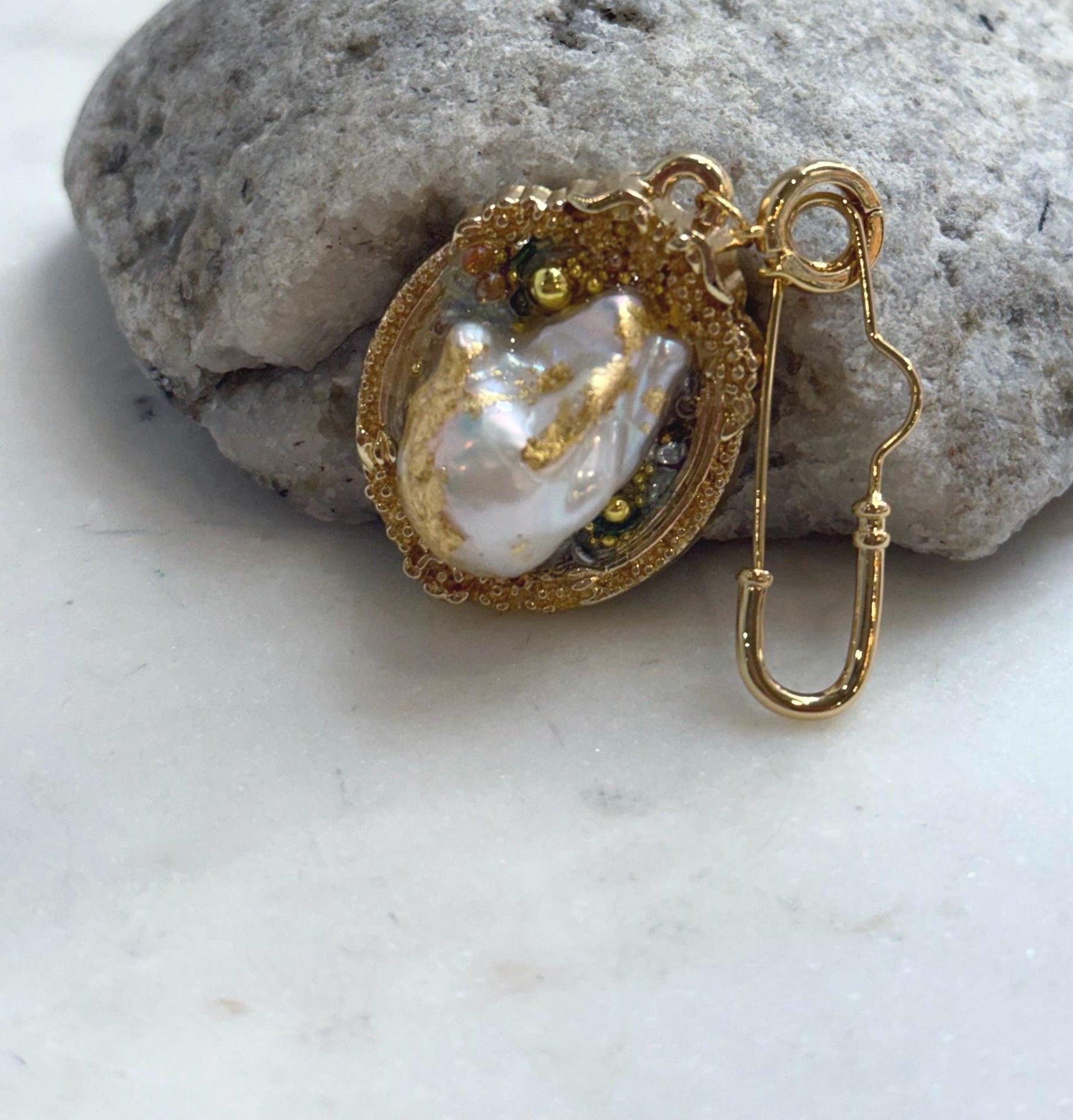 Extreme luster freshwater baroque pearl brooch pendant featuring a beautiful natural irregular pearl shape.