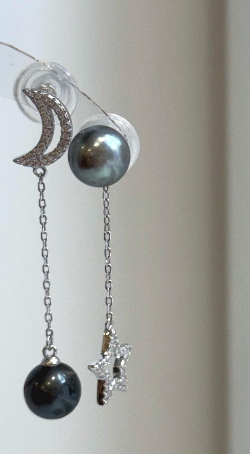 Elegant Tahitian pearl star moon earrings featuring natural platinum hunter tones and sterling silver setting