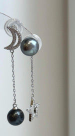 Elegant Tahitian pearl star moon earrings featuring natural platinum hunter tones and sterling silver setting