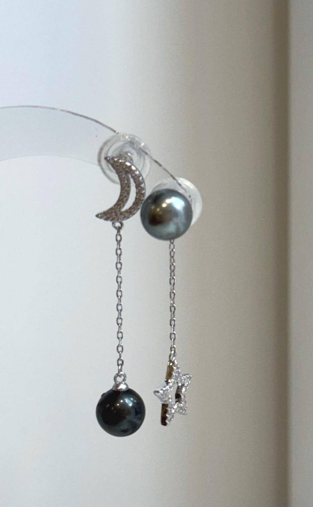 Genuine saltwater Tahitian pearl celestial earrings with rich platinum hunter color and metallic luster