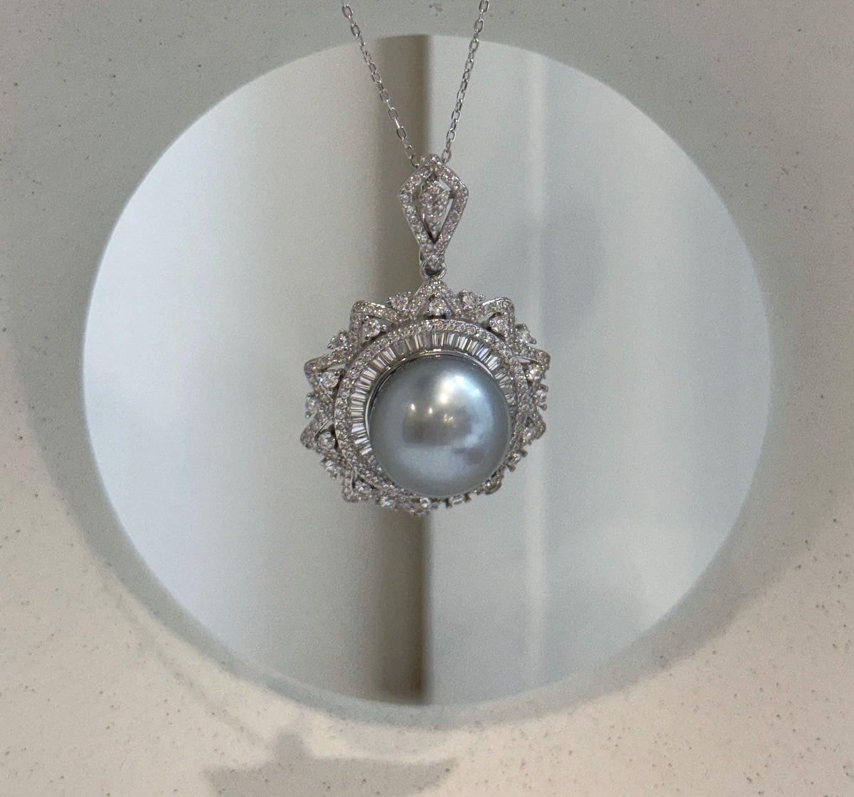 Genuine saltwater Tahitian pearl necklace featuring a huge silver pearl and S925 sterling silver chain.