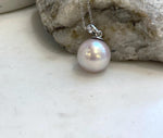 Large light rose Edison pearl pendant featuring beautiful iridescent overtones and extreme mirror-like luster
