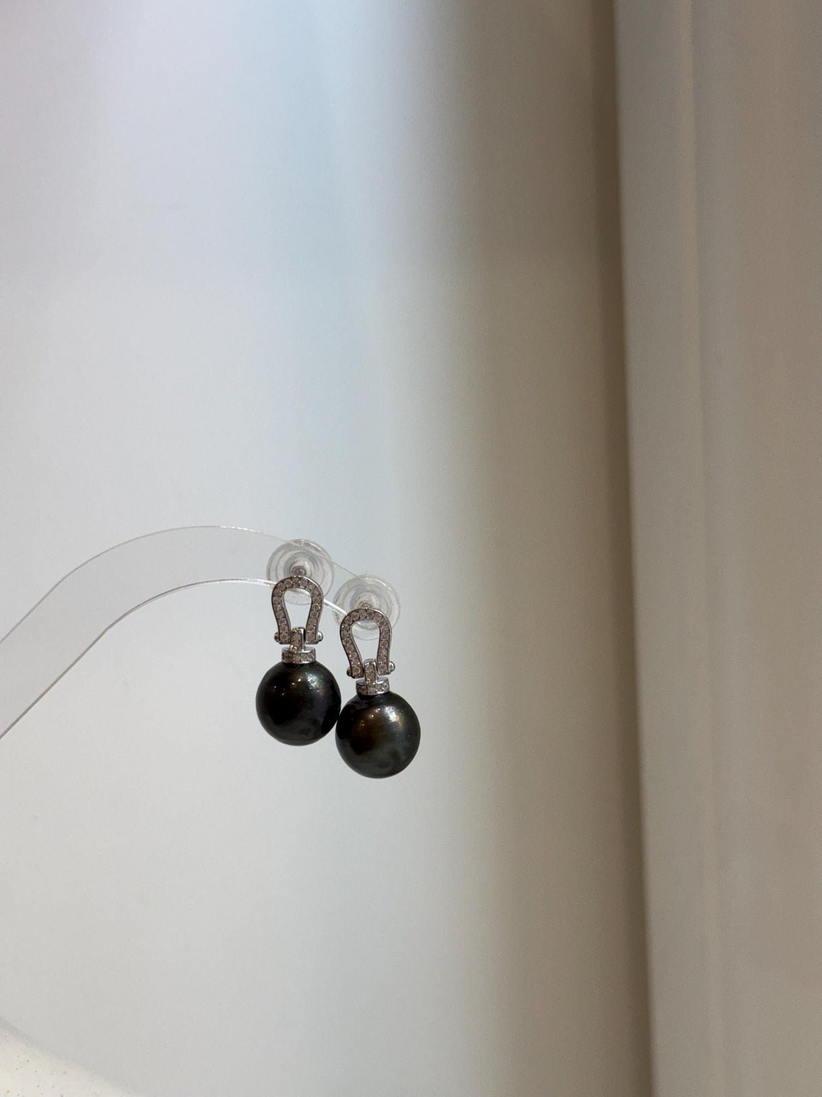 Luxury Tahitian pearl earrings set in S925 sterling silver with beautiful dark peacock hunter tones.