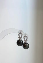 Genuine saltwater Tahitian pearl earrings featuring rich peacock and hunter green overtones with mirror-like luster.