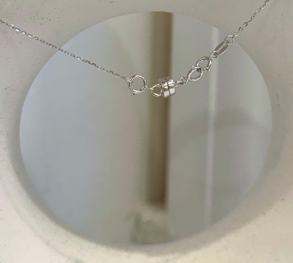Unique Tahitian hunter pearl jewelry with modern organic molten lava pendant design