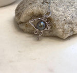 Genuine Tahitian saltwater ocean pearl eye pendant with platinum color and mirror-like luster