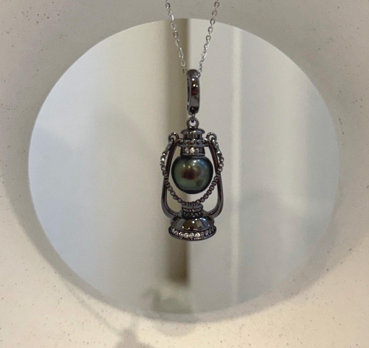 Tahitian peacock hunter pearl necklace with vintage lantern pendant design