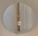 South Sea golden pearl necklace featuring luminous iridescent color, reflective luster and an S925 silver chain.