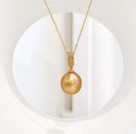 Genuine saltwater South Sea golden pearl pendant with rich deep tea gold color and brilliant luster.