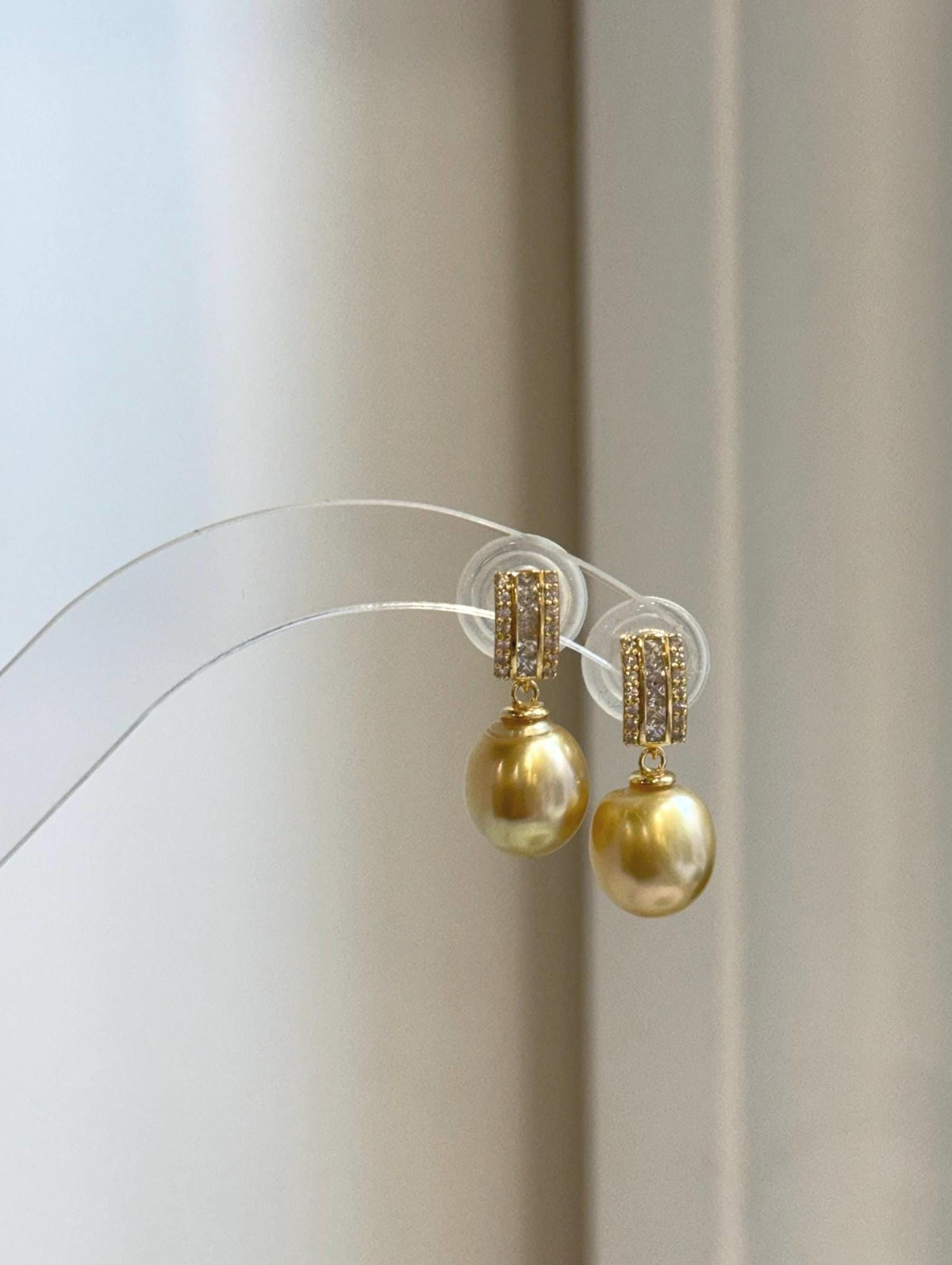 Deep tea golden South Sea pearl dangle earrings with brilliant luster