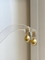Genuine ocean pearl earrings featuring deep tea golden South Sea pearls