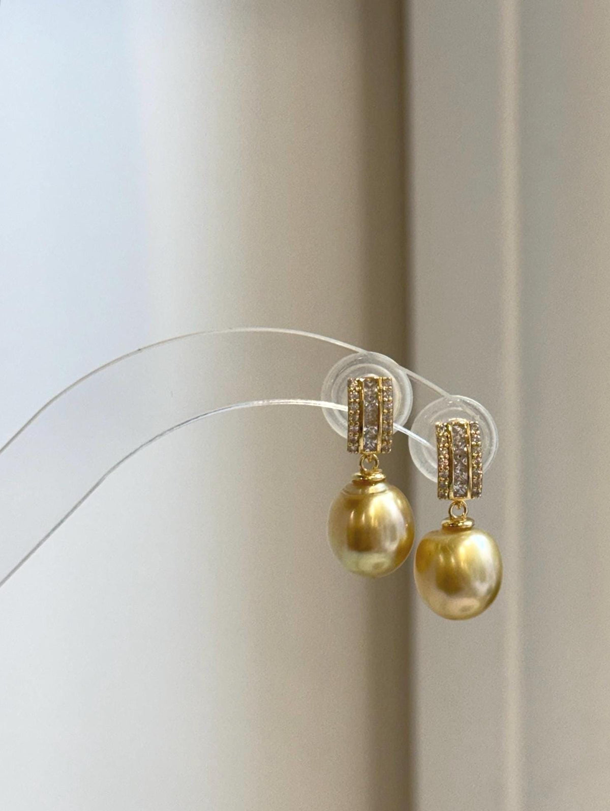 Genuine ocean pearl earrings featuring deep tea golden South Sea pearls