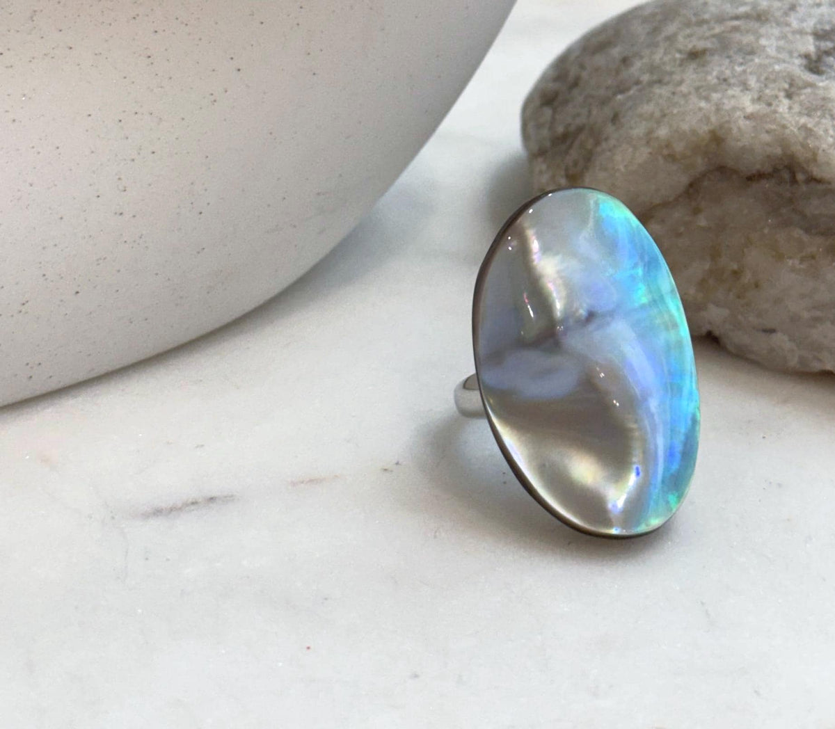 Luxury iridescent Ocean Mabe pearl statement ring with brilliant blue green color play