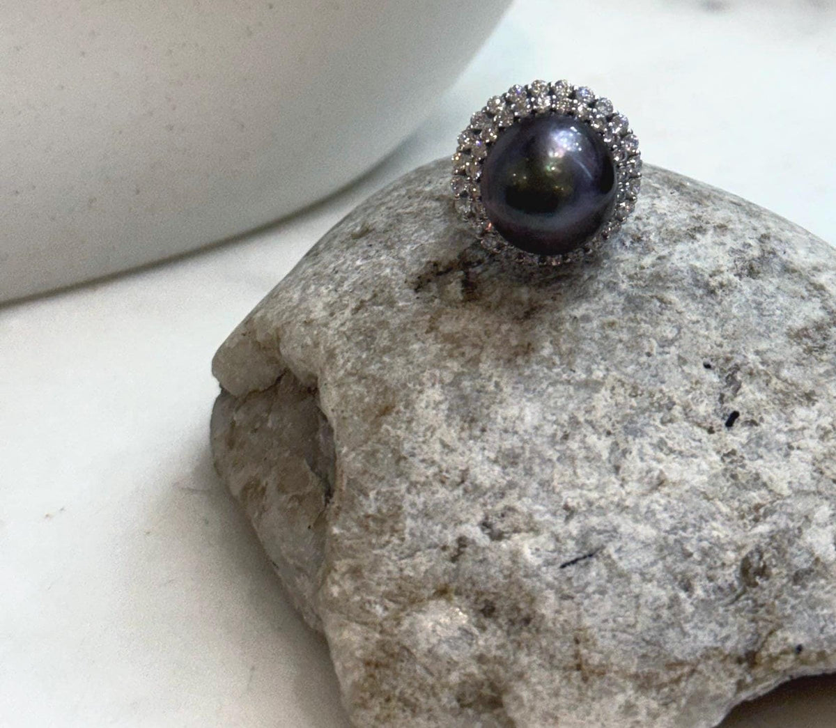 Genuine Tahitian saltwater pearl ring featuring a beautiful sunflower inspired sterling silver design