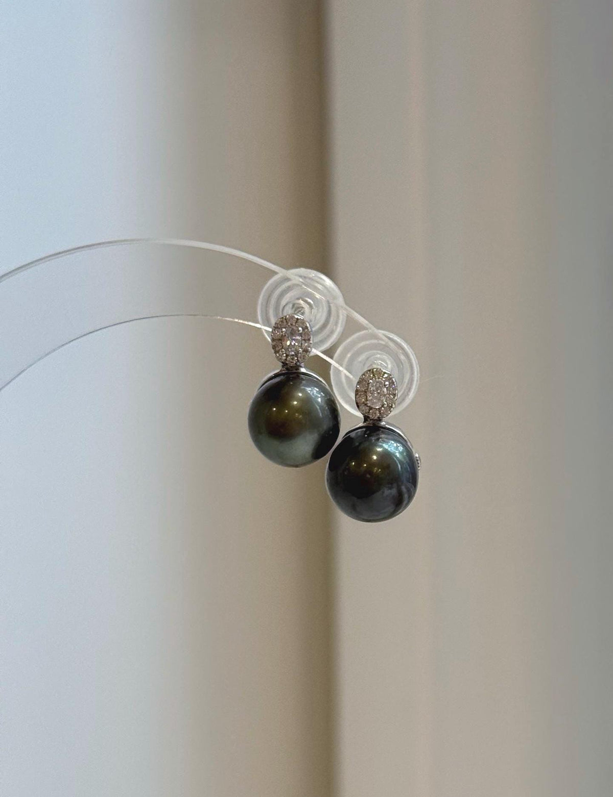 Tahitian black hunter pearl earrings with exceptional mirror luster