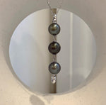 Tahitian pearl necklace extender featuring three luminous ocean pearls and sterling silver components.