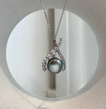 Tahitian peacock green Keshi pearl pendant with extreme luster and S925 sterling silver.