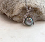 High-luster Tahitian Keshi pearl pendant with beautiful green and peacock overtones.