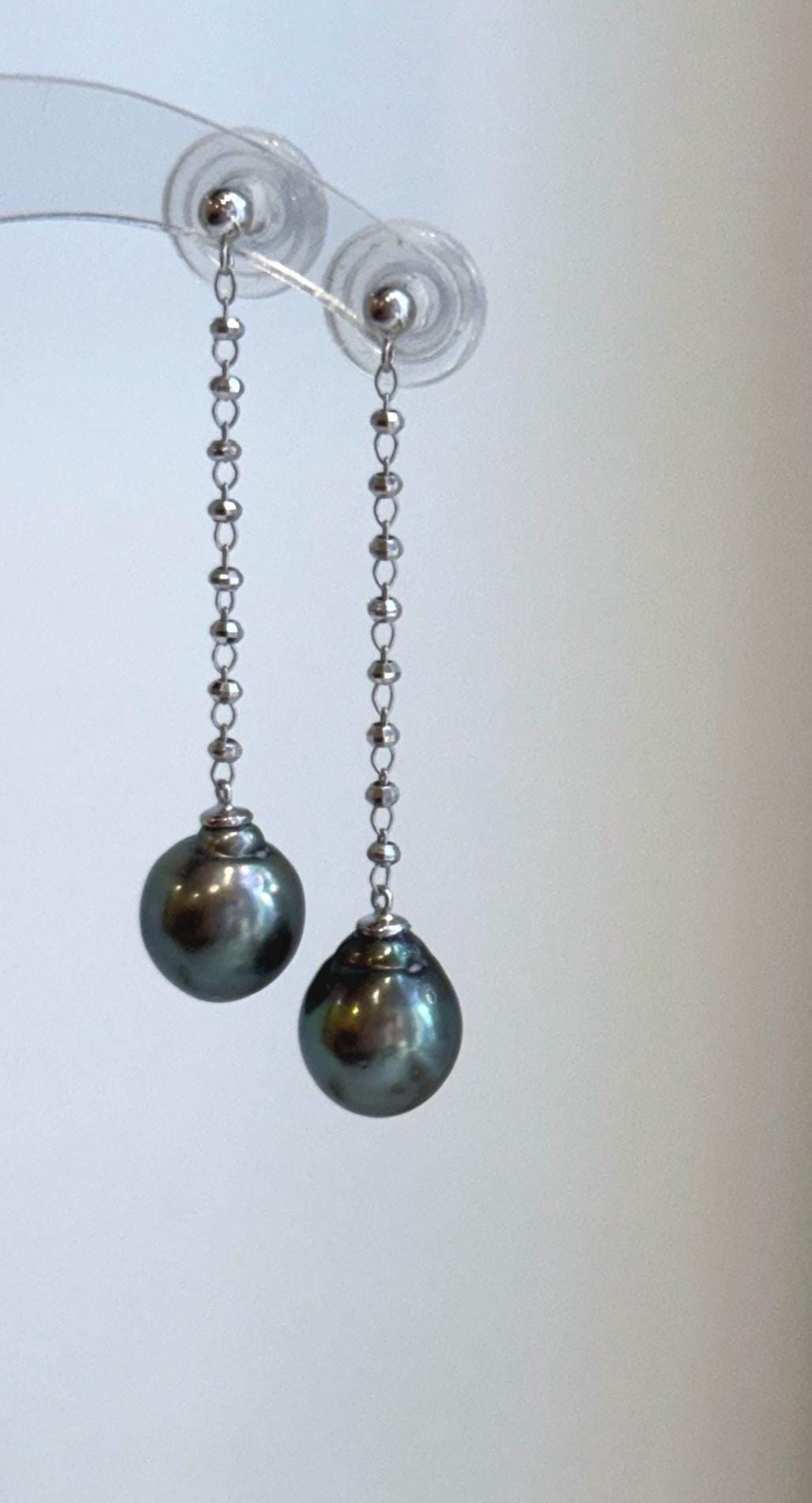 Elegant Tahitian peacock pearl chandelier earrings with rich green overtones and brilliant mirror shine
