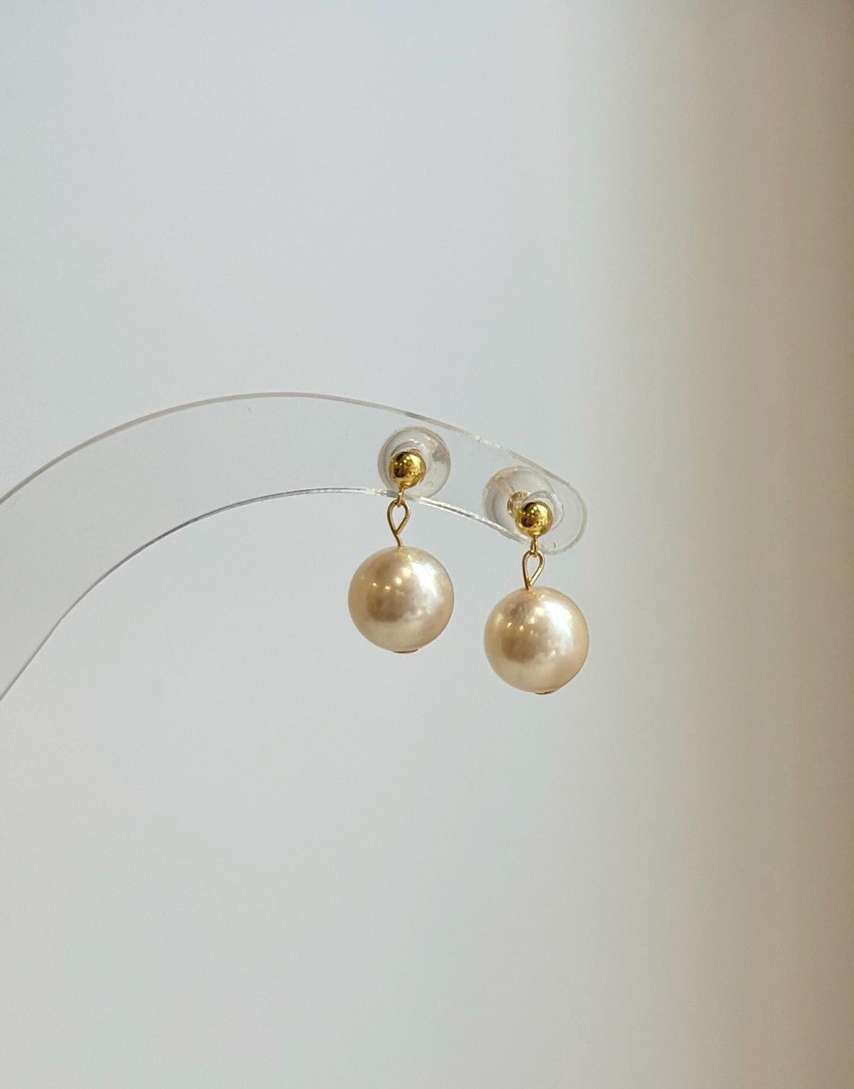 High luster Akoya pearl earrings with creamy ivory color