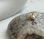 Classic round Akoya pearl ring with elegant 18K gold setting