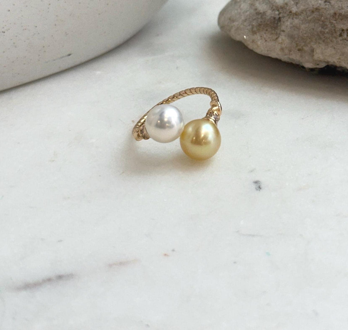 Two-pearl statement ring with genuine golden freshwater pearls and intense mirror luster.