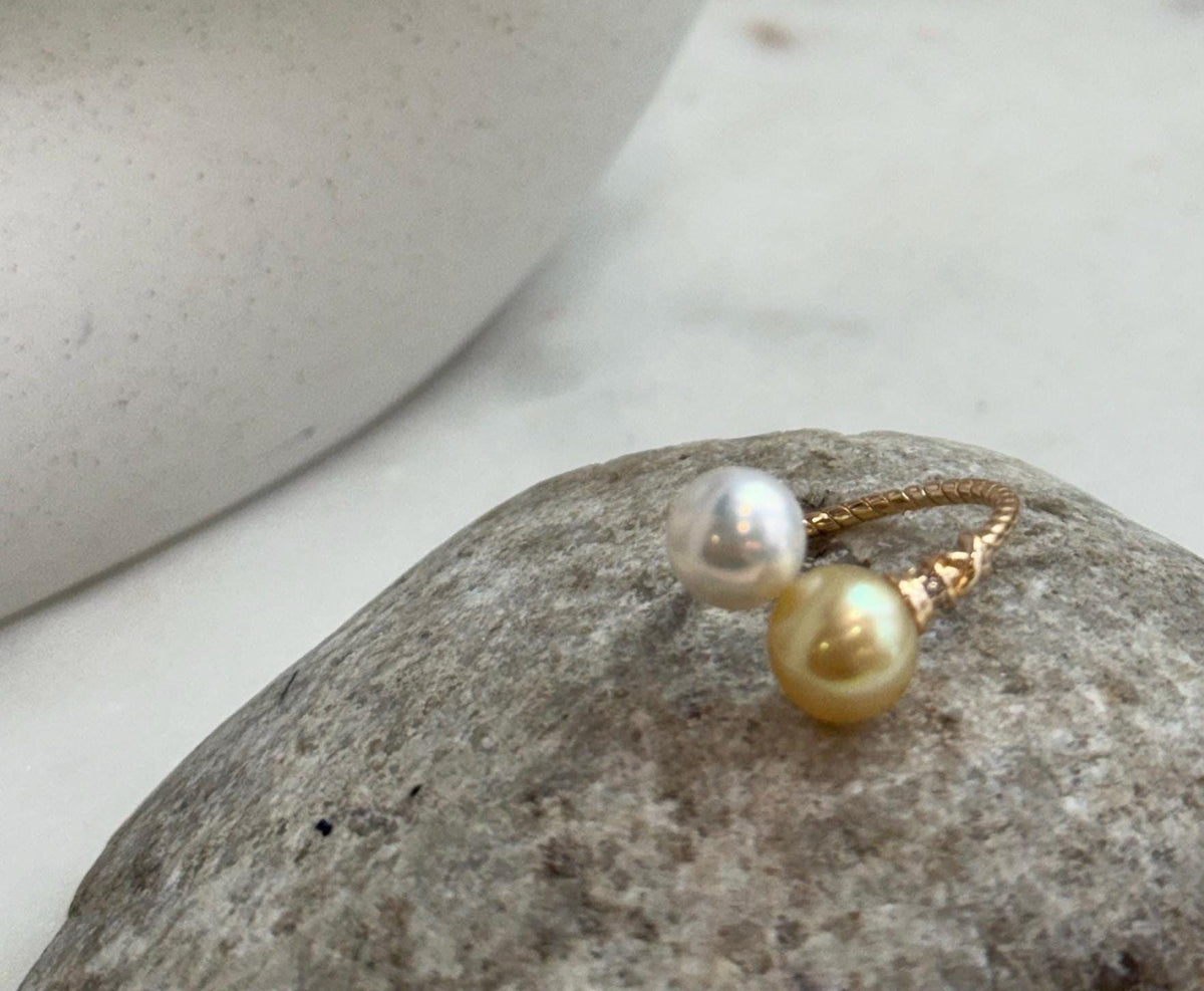 High-luster golden freshwater pearl ring with an adjustable sterling silver open band.