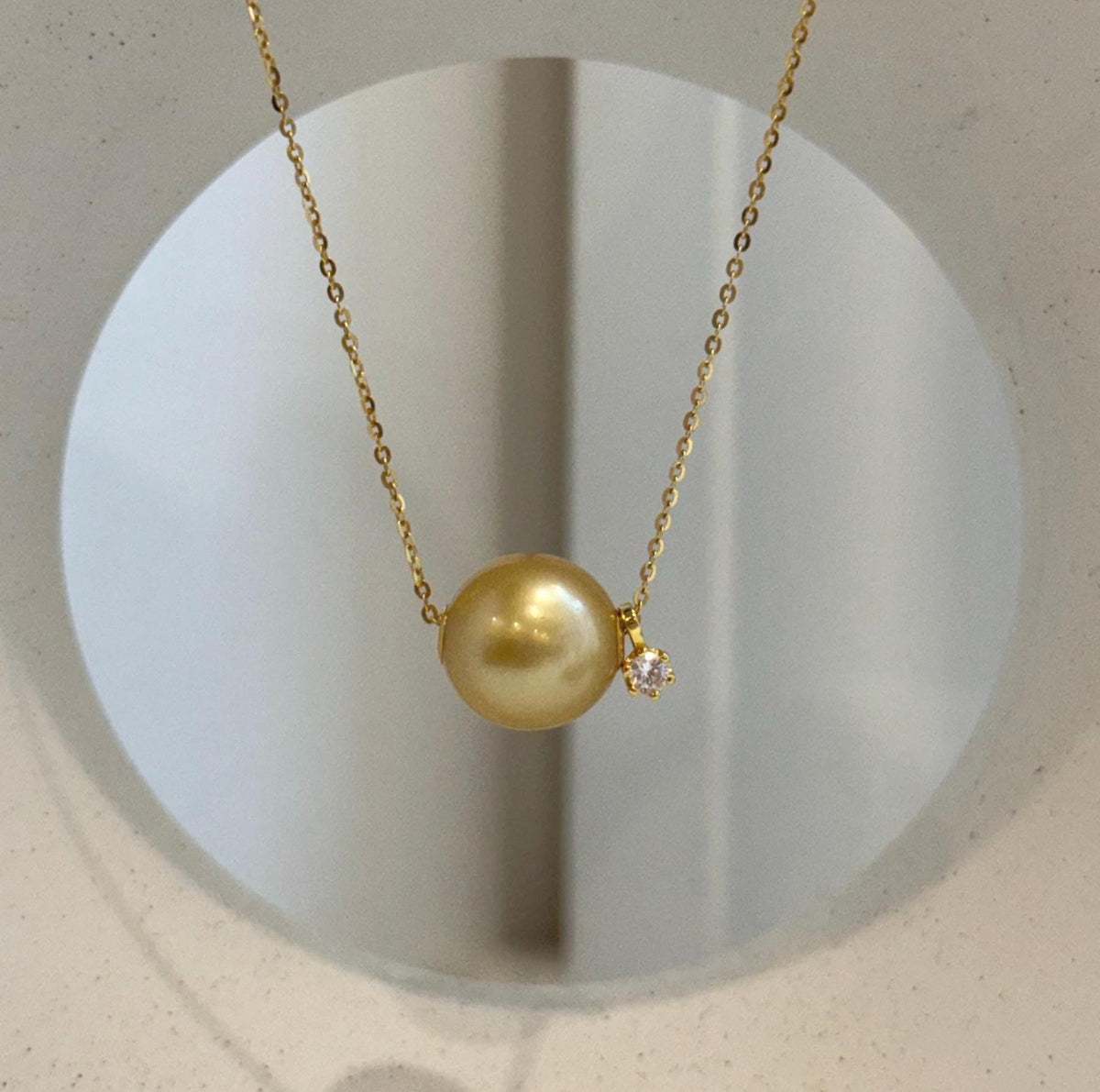 13mm deep tea golden South Sea pearl floating pendant necklace in 18K gold